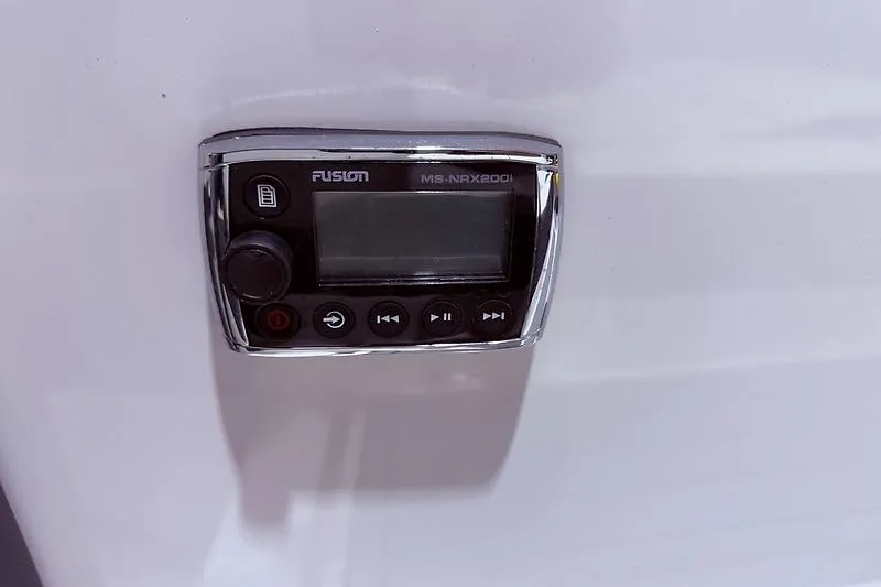 Slide: The Image of Fusion MS-NRX200i marine stereo control on 2016 Regal 24 FasDeck RX boat. - 35