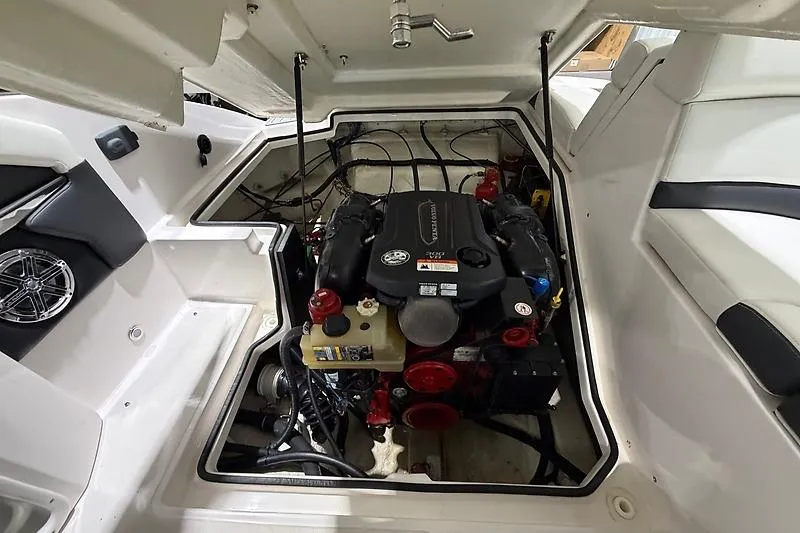 Slide: The Image of Engine compartment of a 2016 Regal 24 FasDeck RX boat, showcasing detailed components. - 40