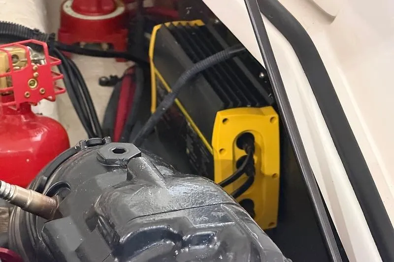 Slide: The Image of Engine compartment of 2016 Regal 24 FasDeck RX with visible components and wiring. - 41
