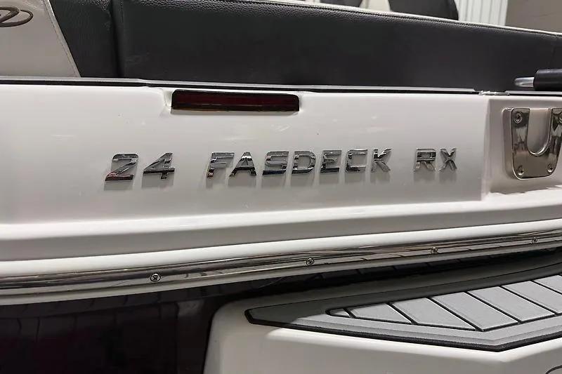 Slide: The Image of 2016 Regal 24 FasDeck RX boat rear view with model nameplate. - 5