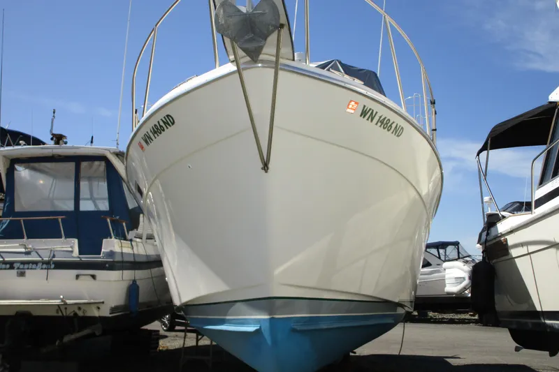 The Image of 1989 Bayliner 3288 Motoryacht docked, showcasing its sleek design and sturdy build. - 0