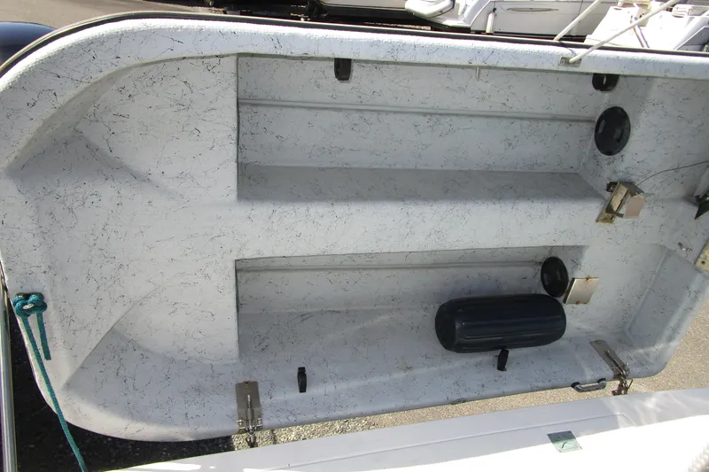 Slide: The Image of Empty interior of a 1989 Bayliner 3288 Motoryacht, showing textured surface and fittings. - 19