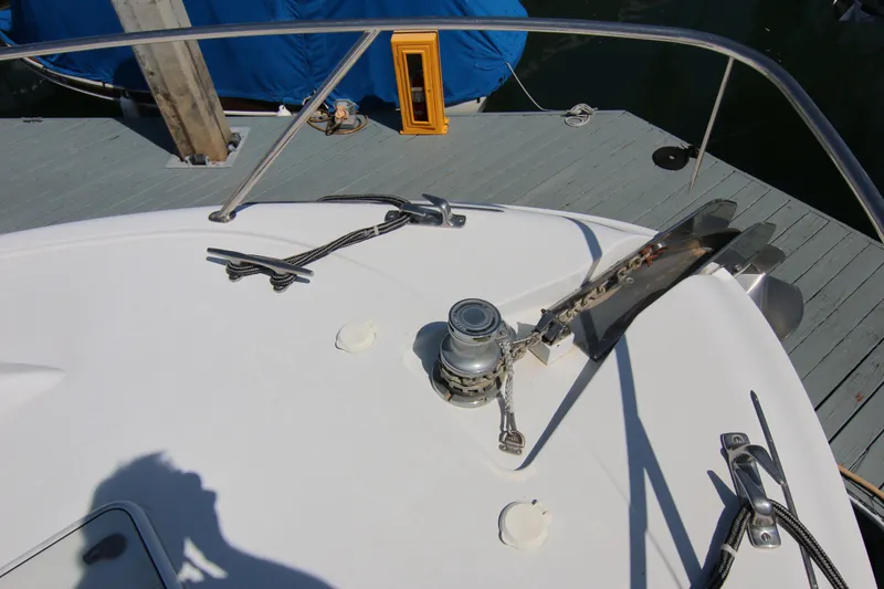 Slide: The Image of Bow of 2002 Hatteras 63 Raised Pilothouse Motor Yacht with anchor and winch system. - 10