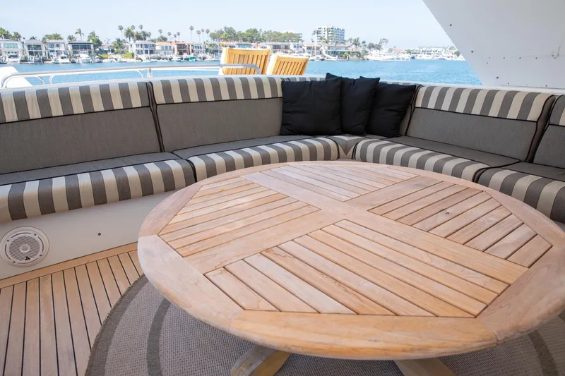 Slide: The Image of Luxurious seating area on 2002 Hatteras 63 Raised Pilothouse Motor Yacht with ocean view. - 82