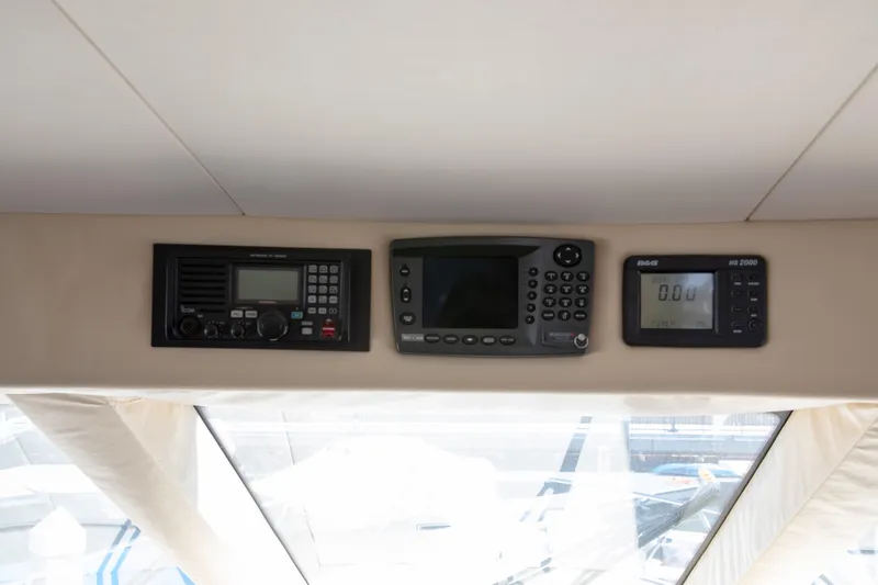 Slide: The Image of Control panel of a 2002 Hatteras 63 Raised Pilothouse Motor Yacht. - 83