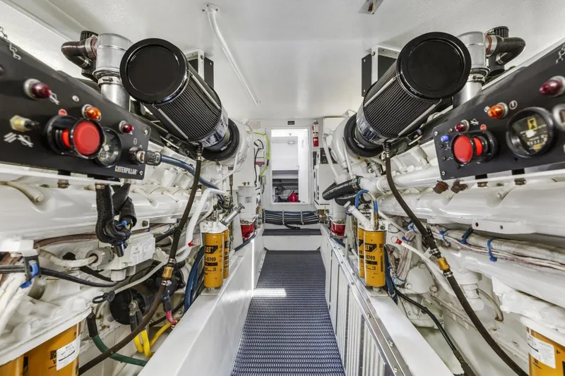 Slide: The Image of Engine room of 2002 Hatteras 63 Raised Pilothouse Motor Yacht with Caterpillar engines. - 88
