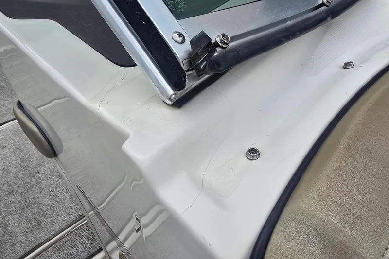 Slide: The Image of Close-up of a 2007 Sea Ray 210 Select boat's windshield and deck area. - 30