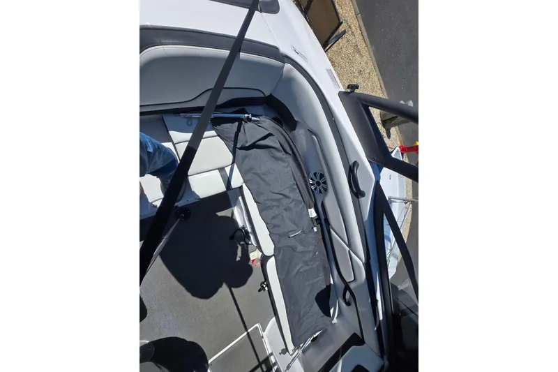 Slide: The Image of 2018 Yamaha Boats AR210 interior with seating and speaker detail. - 19
