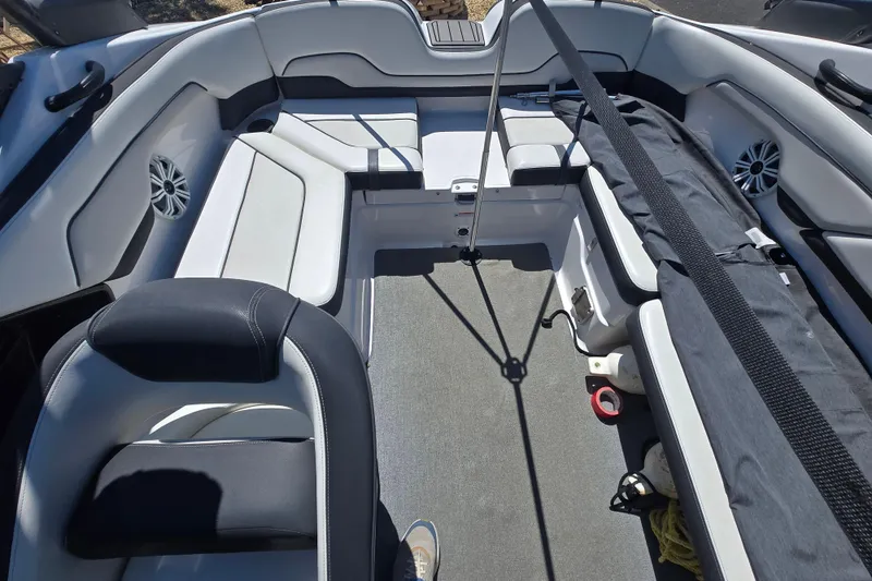 Slide: The Image of Interior of a 2018 Yamaha Boats AR210, featuring spacious seating and modern design. - 4
