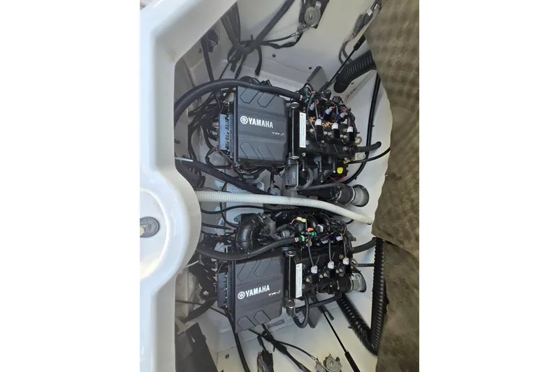 Slide: The Image of 2018 Yamaha AR210 boat engines, showcasing dual Yamaha motors and wiring. - 5