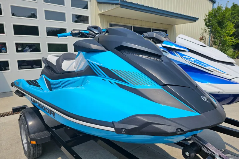 The Image of 2022 Yamaha WaveRunner GP1800R HO in vibrant blue on a trailer. - 0