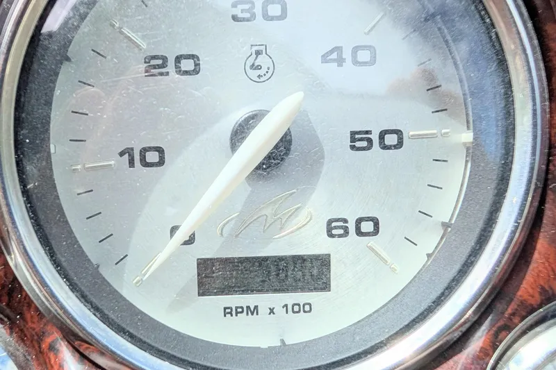 Slide: The Image of Close-up of a 2007 Monterey 248LS Montura Bowrider tachometer showing RPM gauge. - 8