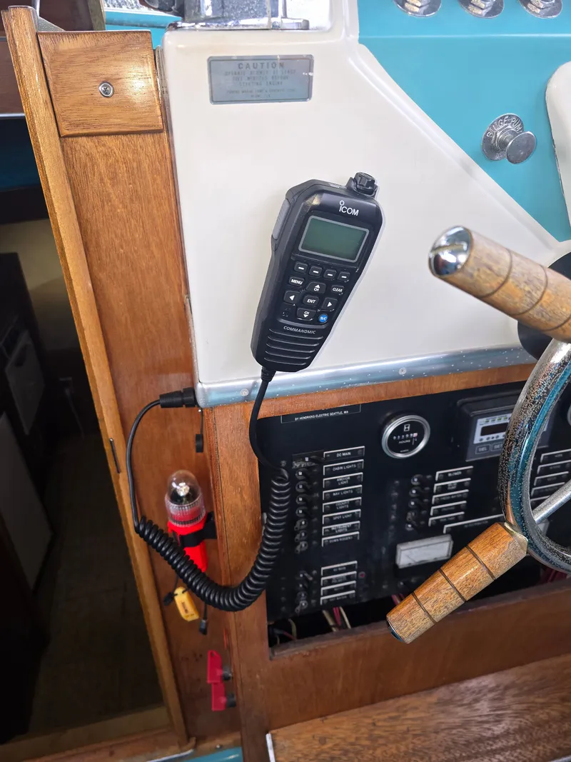 Slide: The Image of 1968 Tollycraft Royal Express helm with radio equipment. - 12