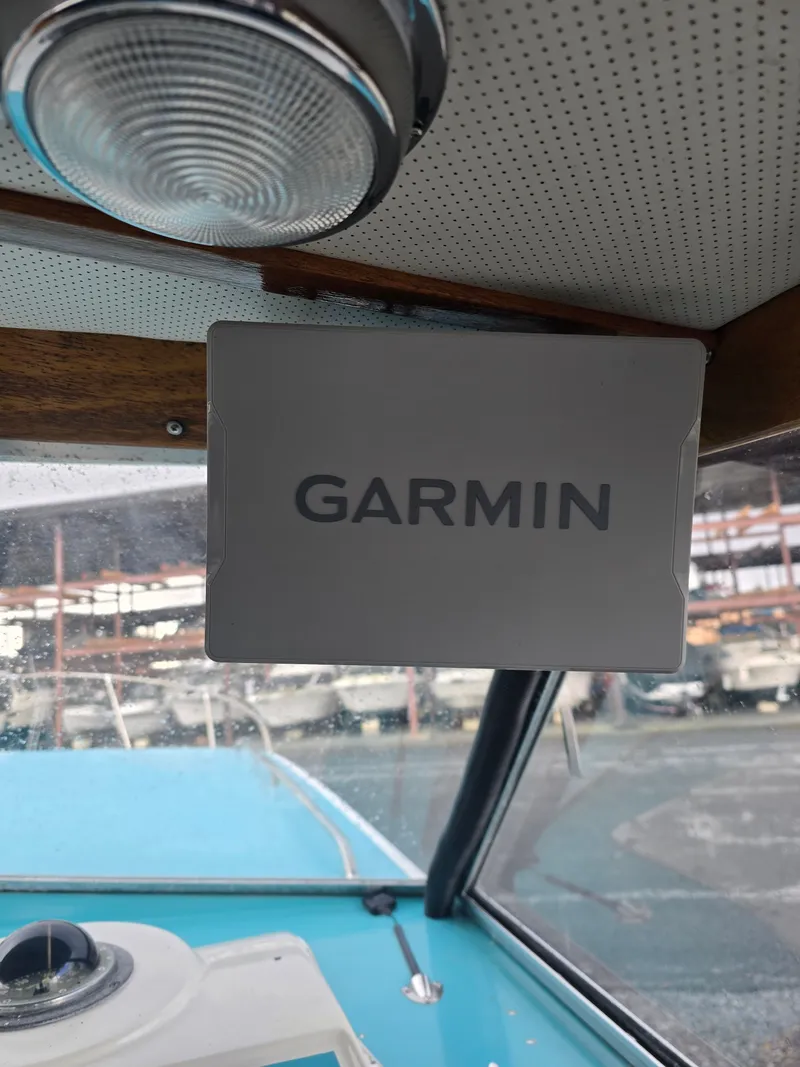 Slide: The Image of Garmin device in the cockpit of a 1968 Tollycraft Royal Express. - 13