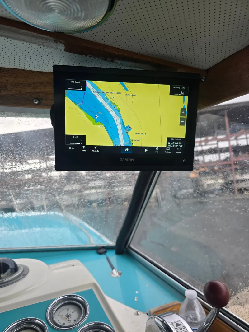 Slide: The Image of Garmin navigation system on Tollycraft Royal Express 1968 boat. - 14
