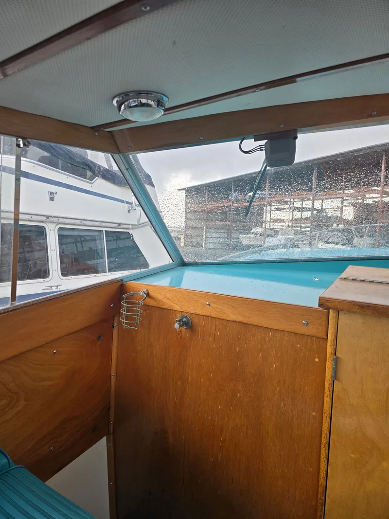Slide: The Image of Interior of a 1968 Tollycraft Royal Express boat with wooden finish. - 15