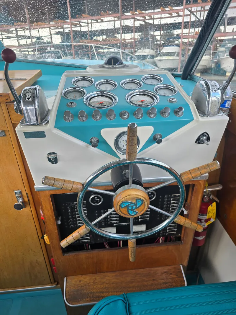 Slide: The Image of Dashboard of a 1968 Tollycraft Royal Express boat. - 7