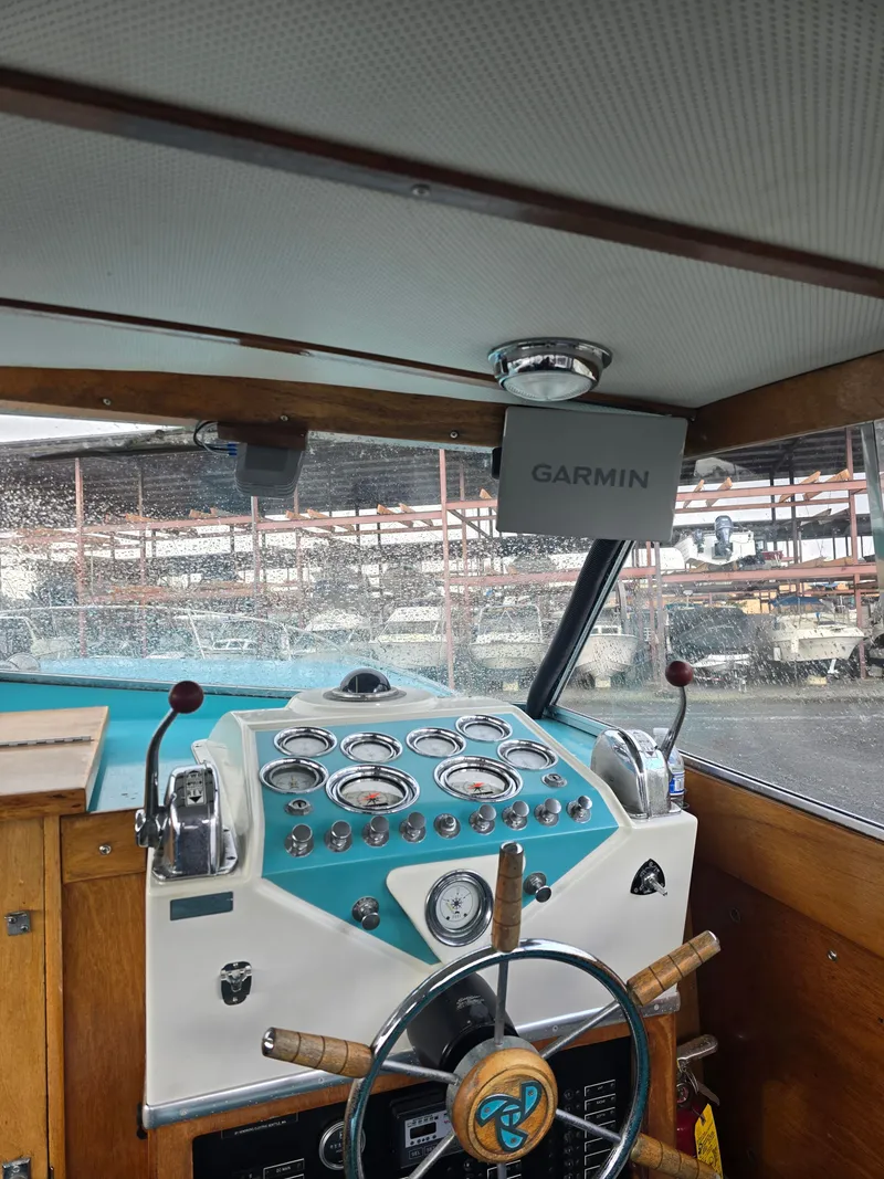 Slide: The Image of Interior of a 1968 Tollycraft Royal Express boat with Garmin device. - 8