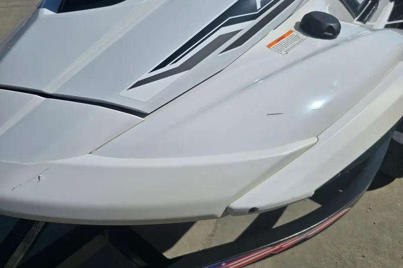 Slide: The Image of 2019 Yamaha WaveRunner FX Cruiser HO, white body with sleek design details. - 11