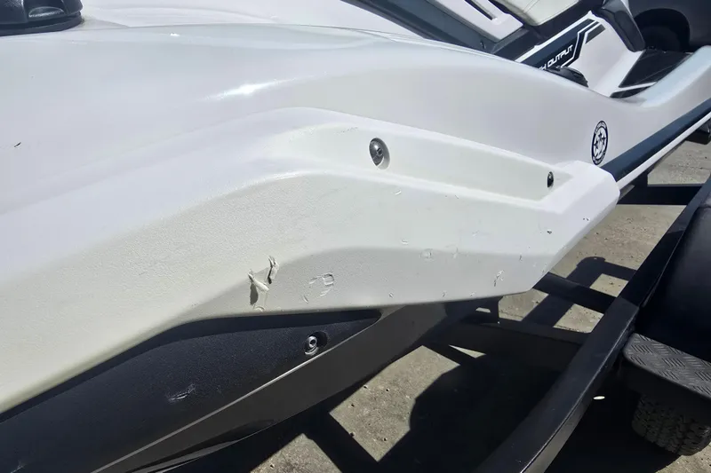 Slide: The Image of 2019 Yamaha WaveRunner FX Cruiser HO with visible hull damage on trailer. - 12