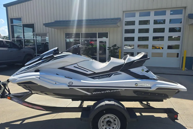 Slide: The Image of 2019 Yamaha WaveRunner FX Cruiser HO on trailer outside a building. - 2