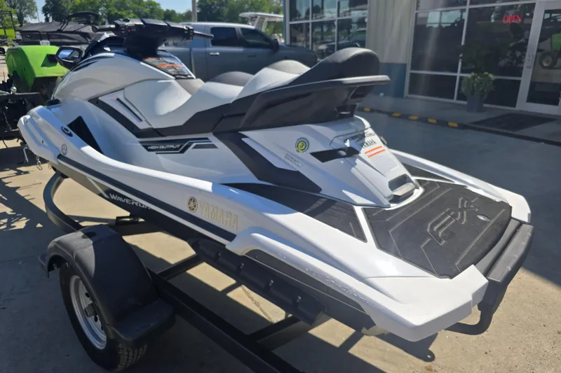Slide: The Image of 2019 Yamaha WaveRunner FX Cruiser HO on trailer, parked outdoors. - 3