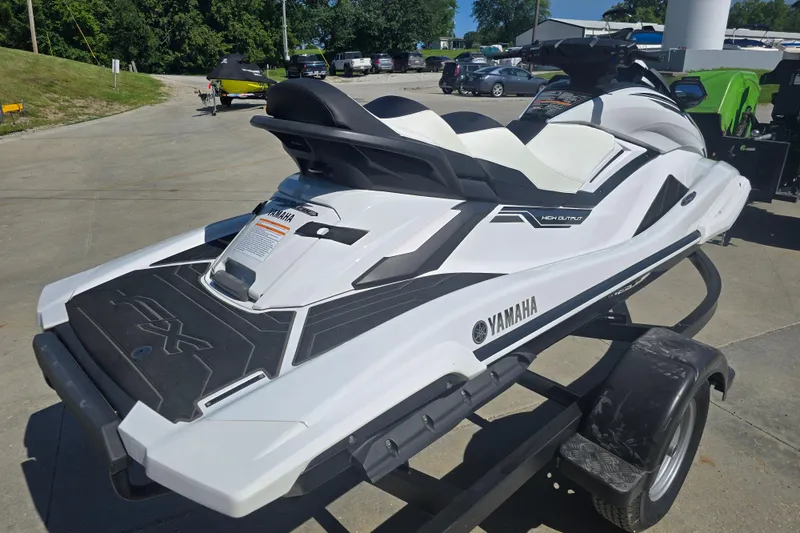 Slide: The Image of 2019 Yamaha WaveRunner FX Cruiser HO on trailer, white and black design. - 5
