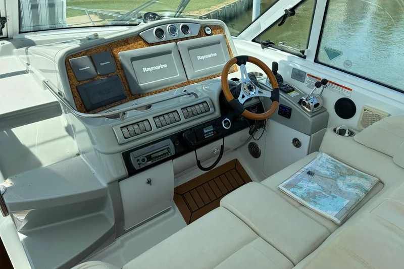 Slide: The Image of Cockpit of 2011 Formula 45 Yacht with Raymarine navigation system and leather seating. - 13