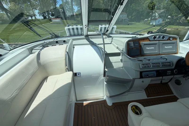 Slide: The Image of Interior of a 2011 Formula 45 Yacht with modern navigation equipment and seating. - 15