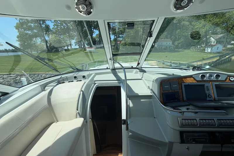 Slide: The Image of Interior view of 2011 Formula 45 Yacht cockpit with navigation controls and seating. - 18