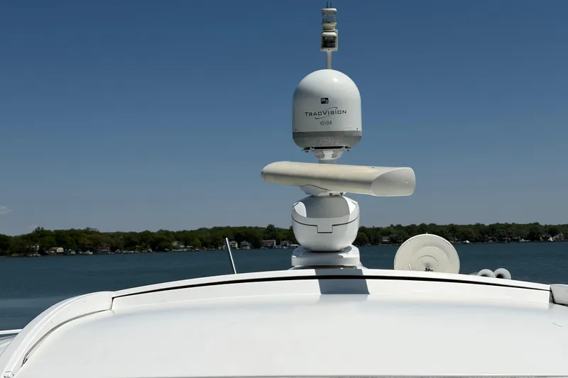 Slide: The Image of 2011 Formula 45 Yacht with TracVision satellite, lake view in background. - 26