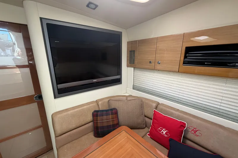 Slide: The Image of Luxurious interior of 2011 Formula 45 Yacht with TV and plush seating. - 27