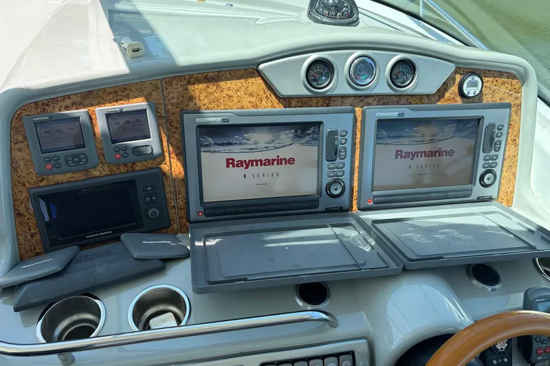 Slide: The Image of Control panel of a 2011 Formula 45 Yacht with Raymarine E Series displays. - 39