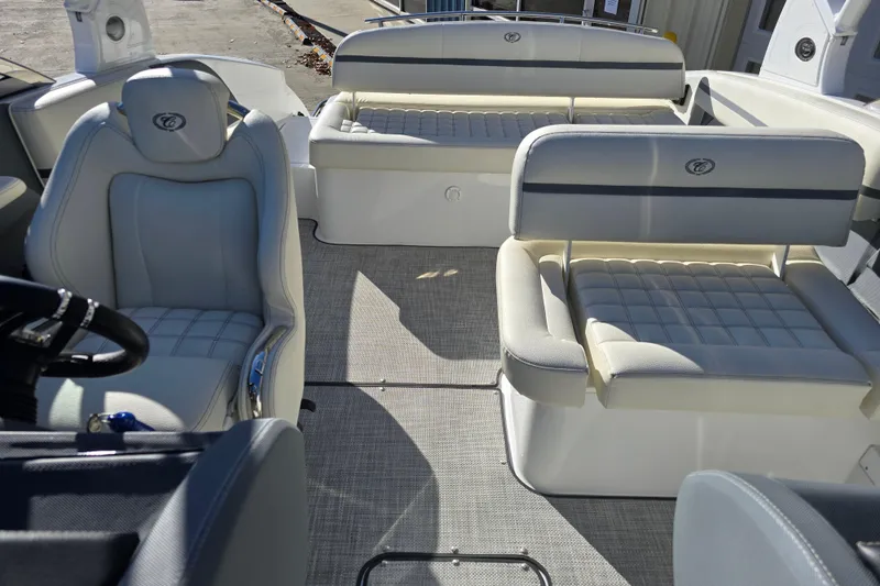 Slide: The Image of Interior of a 2020 Cobalt R3 boat with luxurious seating and modern design. - 12