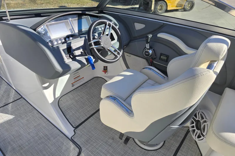 Slide: The Image of 2020 Cobalt R3 boat cockpit with steering wheel and control panel. - 13
