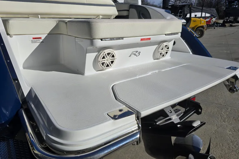 Slide: The Image of 2020 Cobalt R3 boat swim platform with speakers and seating, showcasing sleek design. - 4