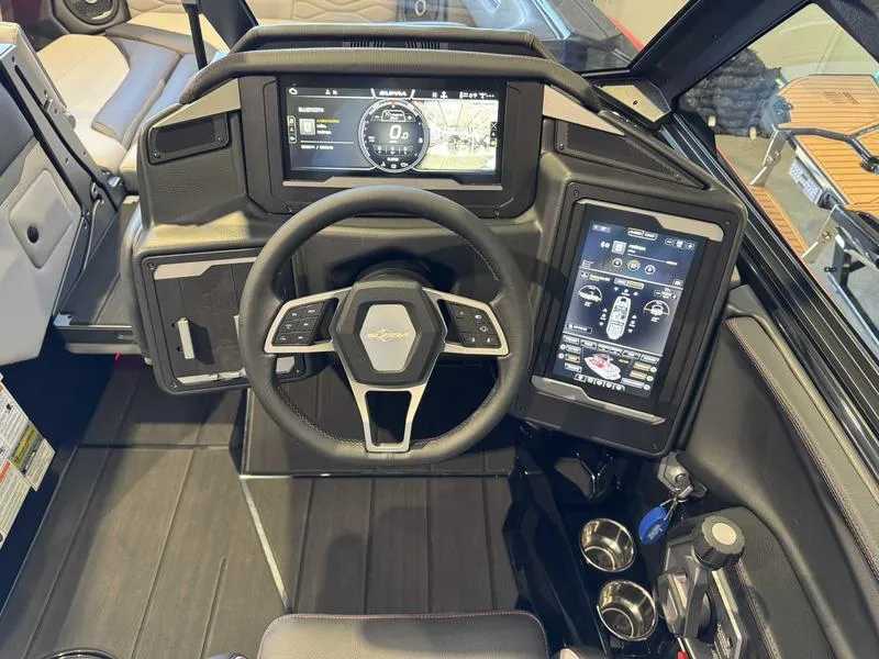 Slide: The Image of 2025 Supra SA boat dashboard with advanced digital displays and modern steering wheel. - 10