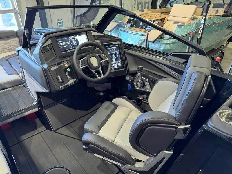 Slide: The Image of 2025 Supra SA boat cockpit with modern steering and control panels. - 8
