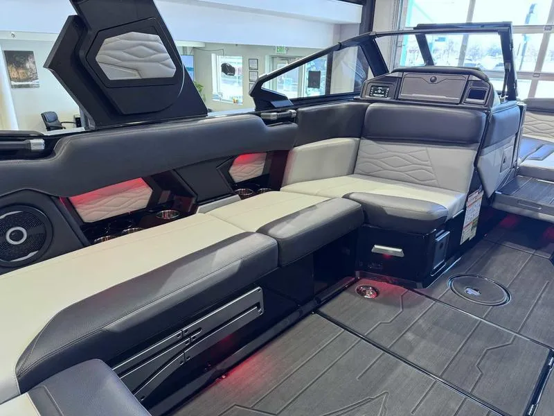 Slide: The Image of 2025 Supra SA boat interior with luxurious seating and modern design elements. - 9