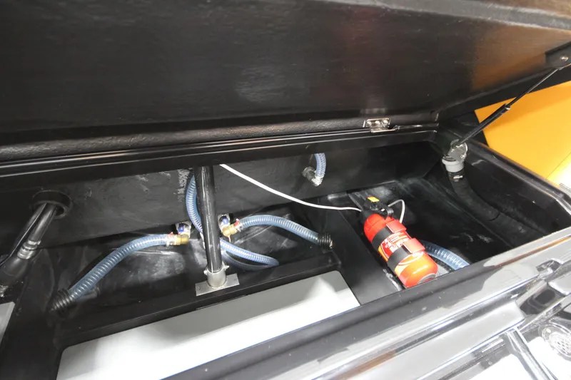 Slide: The Image of Interior view of Iron 767 (2026) vehicle trunk with hoses and fire extinguisher. - 16