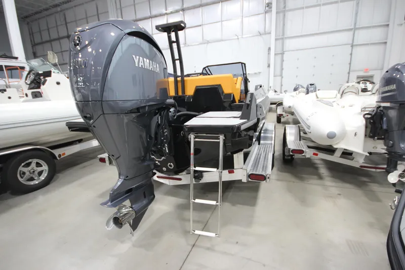Slide: The Image of Boat with Yamaha outboard motor in showroom, Iron 767 model, 2026. - 9