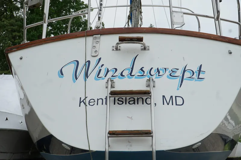 Slide: The Image of 1987 Morgan 43 sailboat named "Windswept" docked at Kent Island, MD. - 4