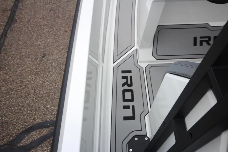 Slide: The Image of Modern Iron 767 boat deck, featuring sleek gray and white design, 2026 model. - 24