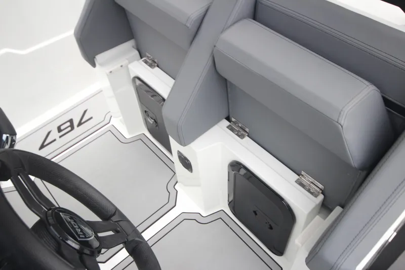 Slide: The Image of Interior of Iron 767 boat, featuring sleek seating and modern design, 2026 model. - 26