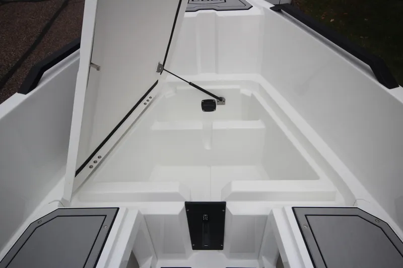 Slide: The Image of Open storage compartment on Iron 767 boat, 2026 model, showcasing interior space. - 31