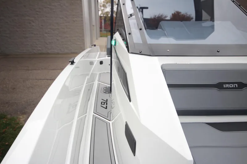 Slide: The Image of 2026 Iron 767 boat with sleek design and modern detailing. - 32