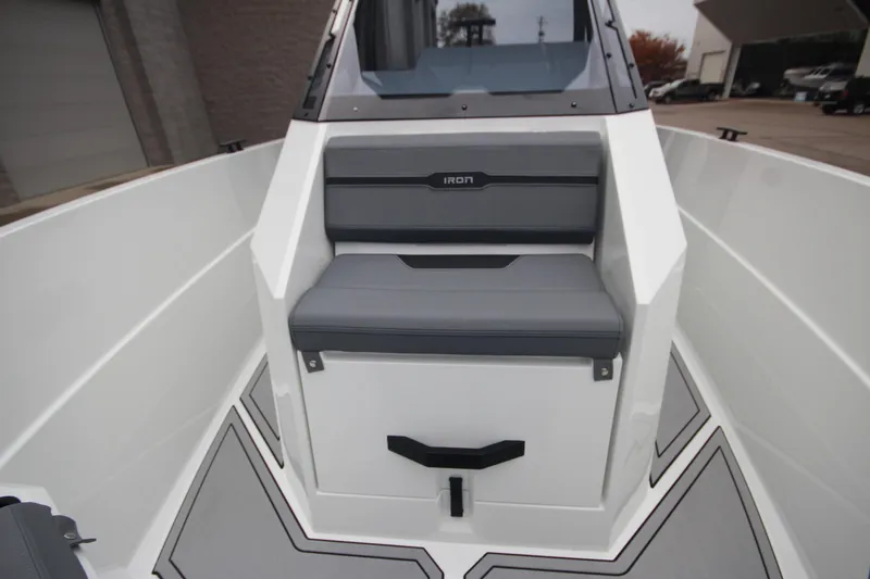 Slide: The Image of 2026 Iron 767 boat interior with gray seating and modern design. - 35