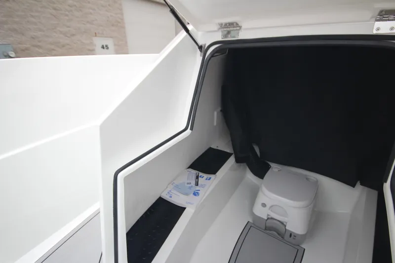Slide: The Image of Compact cabin interior of Iron 767, featuring a portable toilet, 2026 model. - 38