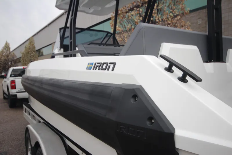 Slide: The Image of 2026 Iron 767 boat on trailer, showcasing sleek design and modern features. - 4