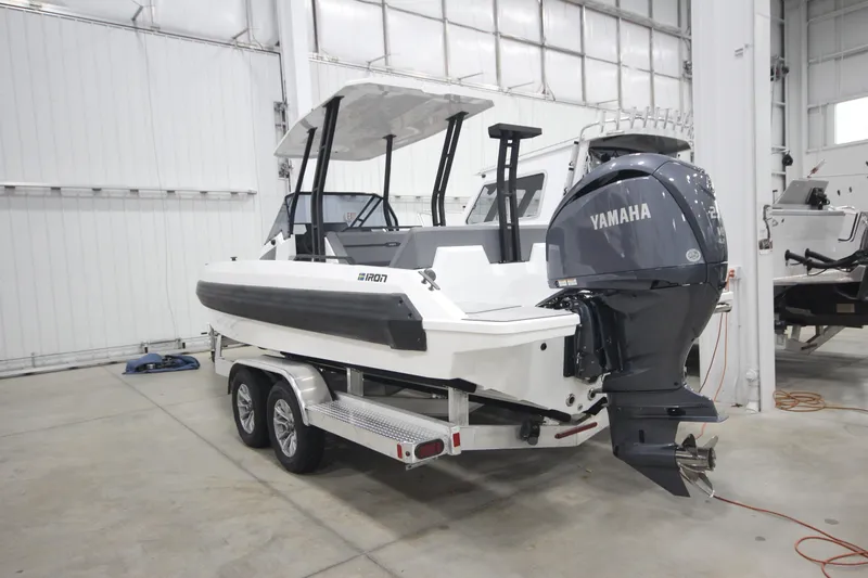 Slide: The Image of 2026 Iron 767 boat with Yamaha engine on trailer in indoor storage. - 43